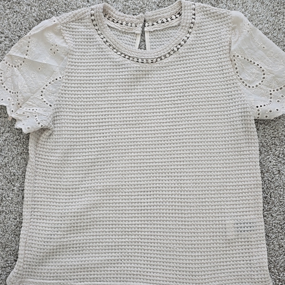 White Sleeveless Top